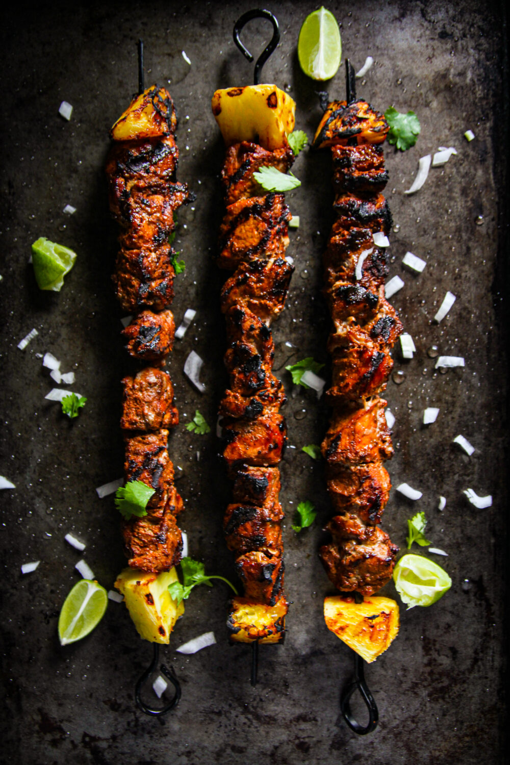Live Fire Al Pastor-Inspired Kabobs - An open fire twist on the Central American recipe classic, made directly in your backyard!