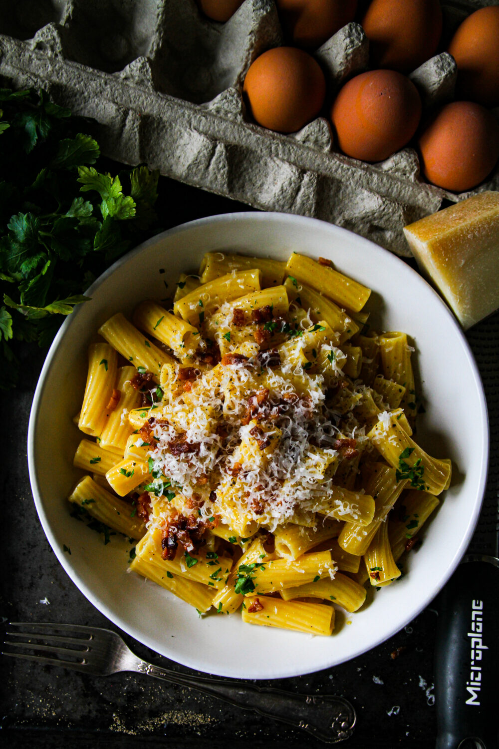 Eggs and plenty of parm equals and entirely irresistible, creamy, rich and smoky pasta carbonara