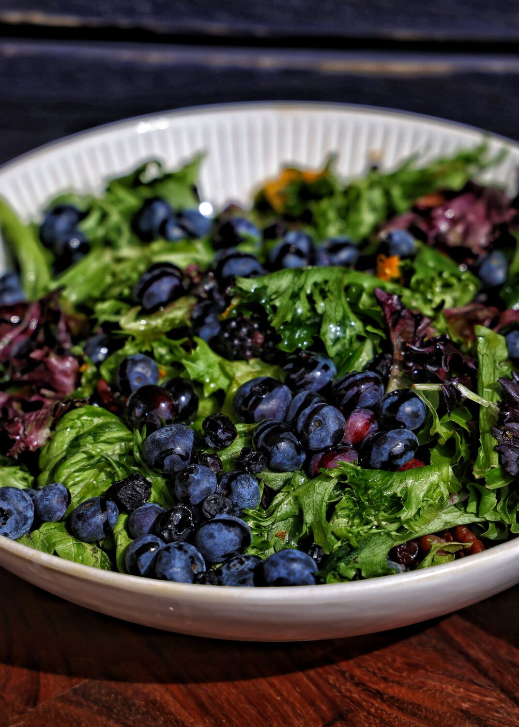 Black and Blueberry Spring Greens Salad:Â Simple, fresh and light. This salad combines fresh berries, toasted pecans, spring greens, and all finished with a tangy lemon-honey vinaigrette.