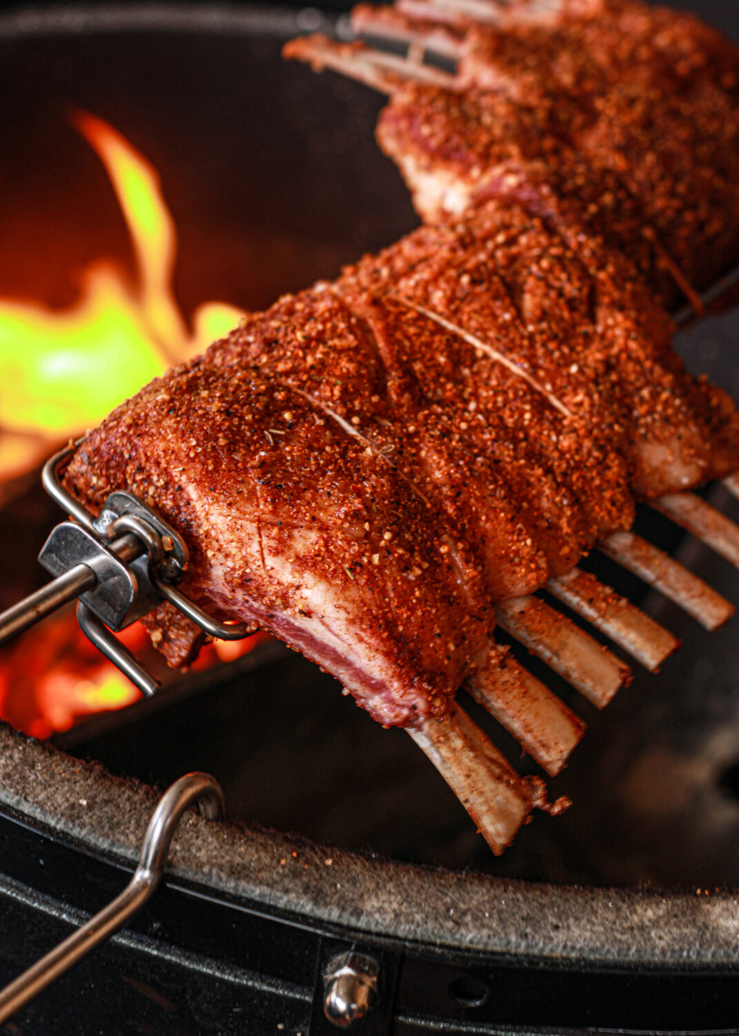 seasoned rack of lamb over flame