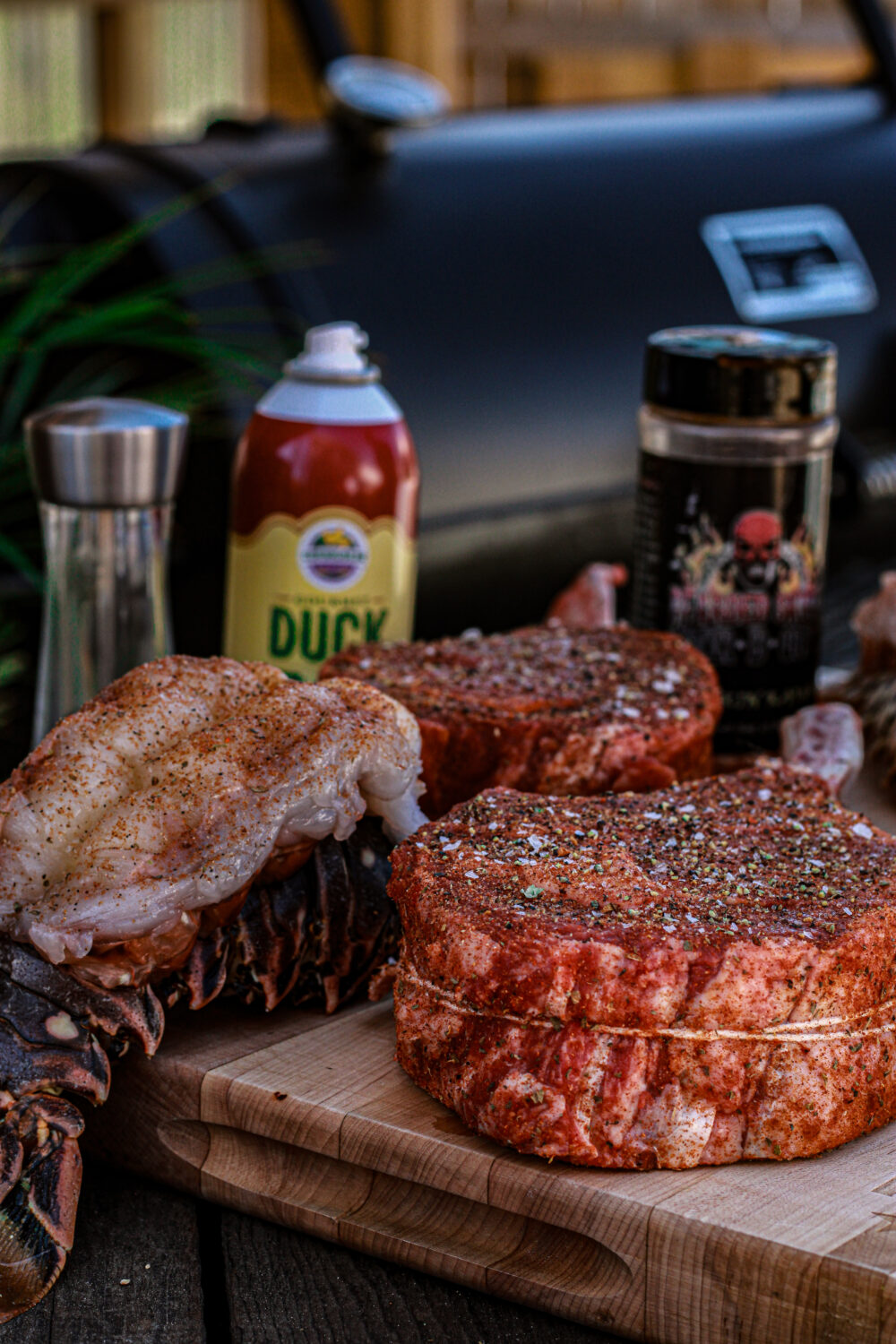 seasoned steaks and lobster tails